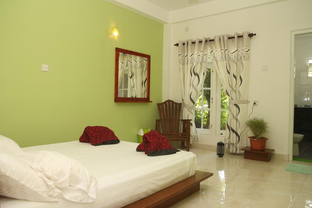 Sanovin Hotel Mirissa Kamer foto